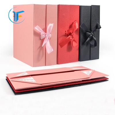 China Handmade Black Luxury Magnetic Foldable Gift Box With Ribbon for sale