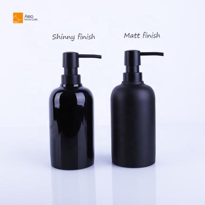 China Luxury Matte Black Shiny Liquid Resin Bottle Lotion Dispenser Liquid Soap Bottle Polyresin Bathroom Custom Home/Hotel Bottle for sale