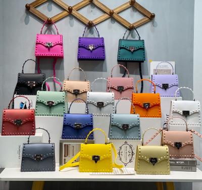 China 2021 Metal Jelly Bag PVC Handbag Female Rivets Factory Wholesale Women's Cross - Body Handbags for sale