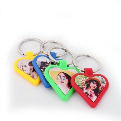 China Women Plastic Keychains Heart Shape Sublimation Doule-Sided Small Heart Blank Logo Keychains ODM OEM for sale