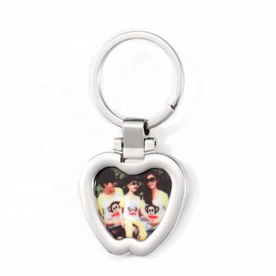 China Round Blank Promotion Gift Sublimation Replaced Metal Custom Logo Keychain for sale