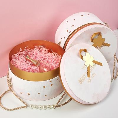 China Handmade Hot Selling Luxury Round White Paper Gift Packaging Boxes Girlfriend Gift Box For Perfume Or Flower for sale