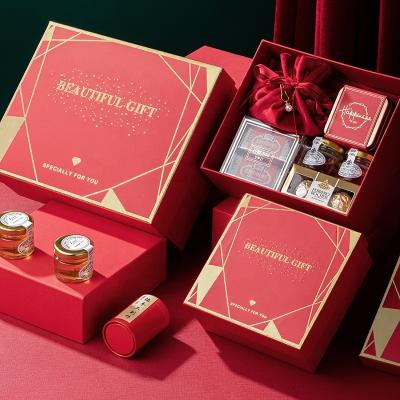 China Recyclable Multi Size Red Color Paper Candle Gift Box Essential Oil Gift Box With Gift Bag For Wedding for sale