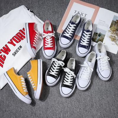 China Wholesale Fashion Trendy Unisex Mens Womens White Canvas Shoes Comfortable Lace Up Classic Low Top Canvas Sneakers Casual Shoes for sale