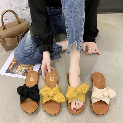 China Fashion Ladies Slippers Open Toe Summer Designer Beach Slippers Bowknot Trend Flat Casual Women Wholesale Cheap Sandals for sale