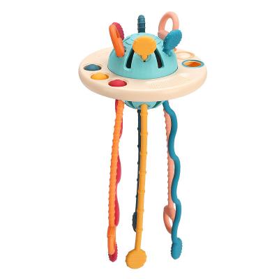 China Child Toy Gifts Interactive Finger Training Teether Silicone Baby Educational Sensory Pull String Activity Rattle Toy Unisex UFO Pull String Toy for sale