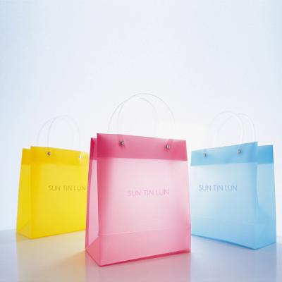 China Recyclable Portable Shopping Bag Gift PVC Frosting Transparentpacking Tote Bag With Handle for sale