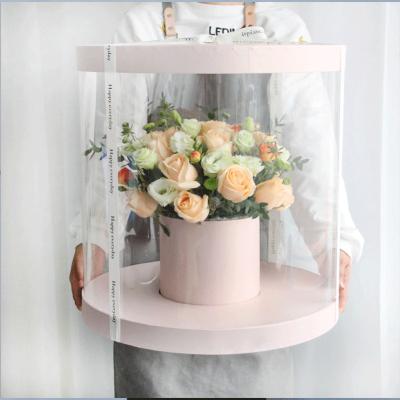 China Recyclable Custom Clear Plastic Preserved Bouquet Packaging Clear Cylindrical Round Gift PVC Flower Box For Flowers With Ribbon for sale