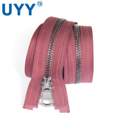 China Sustainable UYY Highly Polished #5 Brass Metal Zipper c/e Zipper For Jackets for sale