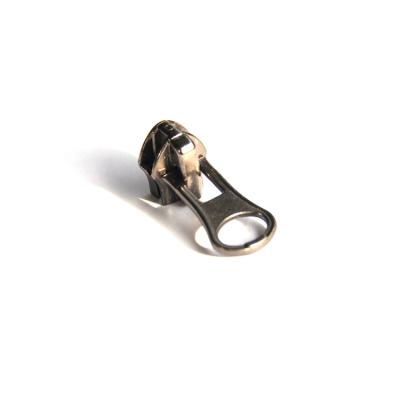 China Bag And Suitcase Resin Zipper 5# Nickel Free Metal Slider Metal Zipper Sliders for sale