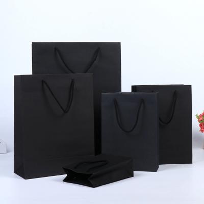 China Recycled Materials Manufacturers Wholesale Shopping Bags Packaging Gift Bags Card Thick Black Handbag for sale