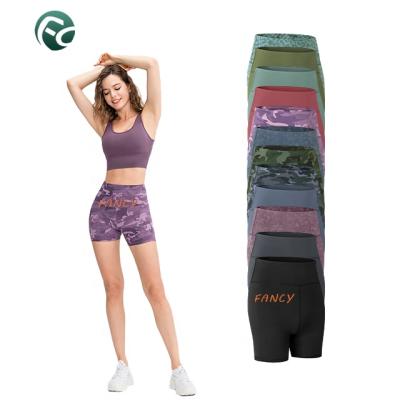 China Anti-Wrinkle Yoga Fitness Women's Running Tight Lift Tie Dye Biker Shorts Women for sale