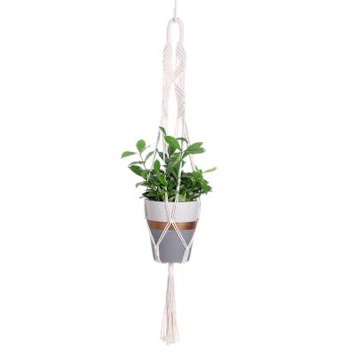 China Handmade Home Decor Boho Cotton Rope Macrame Wall Hanging Wood Woven Plant Europe Cotton Flowers Basket Hangers for sale