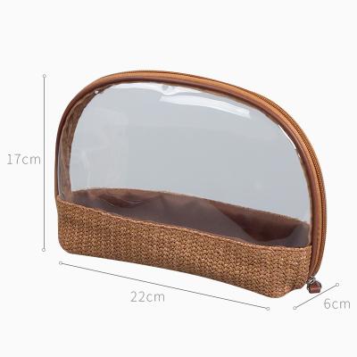 China Can Be Washed 2022 New Summer Girls Fashion Clear PVC Single Color Straw Woven Patchwork Waterproof Cosmetic Bags for sale