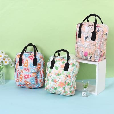 China Cheap price water resistant custom printed wholesale outdoor backpack for women and girls mom small diaper backpack for travel for sale