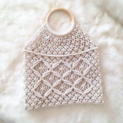 China Large Capacity Woven Round Cotton Bag Rattan Handle Grass Bag Diamond Pattern Hollow Handbag for sale