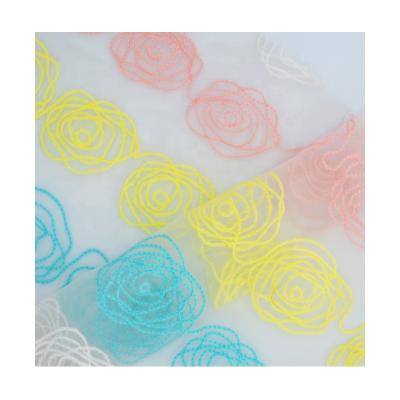 China Organic Flower Embroidered Organza Fabric Sheer Dress Fabric Clear for sale