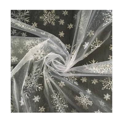 China White Organza Printed Fabric Organic Christmas Snowflake Tulle Hot Stamping Fabric for sale