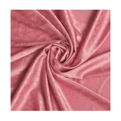 China Organic Floral Tulip Patterned Satin Lining Fabric Jacquard Satin Fabric For Nightgowns Sleep Wear for sale