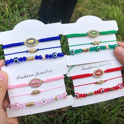 China Religious 3pcs/set Religious Crystal Evil Eye Charms Set Saint Jude Virgin Mary Red Braided Rope String Bracelet for Protection Gifts for sale