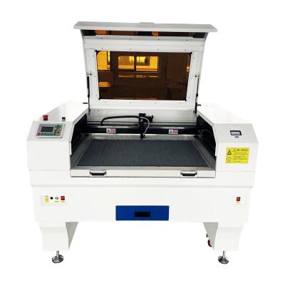 China Water cooled chylaser 6040 4060 60w 80w 100w CO2 laser engraver cutter machine price and wood laser for sale