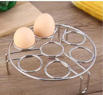 China Sustainable Steaming Rack Home Kitchen Cooking Instrument 7 Holes Round Small Egg Rack Triangle Egg Steamer Rack for sale