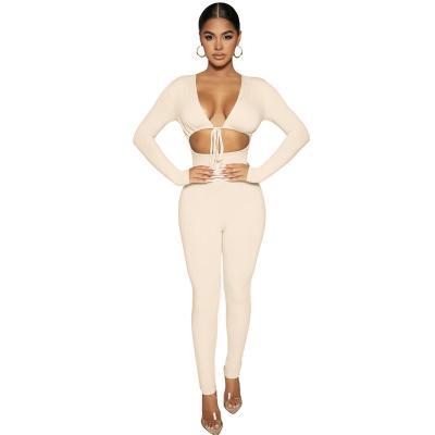 China Autumn Winter Tight Breathable Long Sleeve Pants Sexy Deep V Neckline Rompers Overalls Casual Women Hollow Out Bandage Techniques for sale