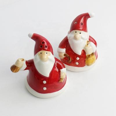 China Sustainable 2022 Father Christmas Porcelain Salt And Pepper Set Kitchen Table Storage Bottle Set Ceramic Shaker for sale