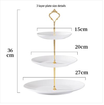 China Sustainable Modern Ceramic Multi Layer Dish Fancy Wedding 3 Tier Round Porcelain Cake Stand With Gold Line for sale