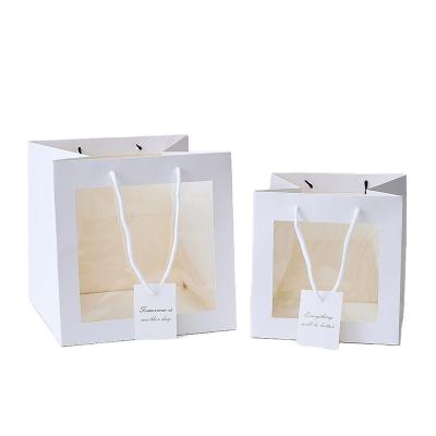 China Recyclable Clothes Pants Paper Gift Bag Birthday Gift Flower Shop Florist Packaging Bags for sale