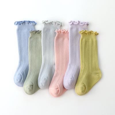 China New Antibacterial Solid Pure Color Non Slip Baby Warm Breathable Lengthened Socks for sale