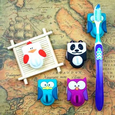 China Stocked can be customized cute little animals are super cute household suction cup PVC resin toothbrush holder for sale