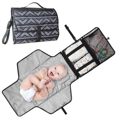 China Special design durabe and convenient foldable travel baby diaper portable diaper cover can store washable pad for sale