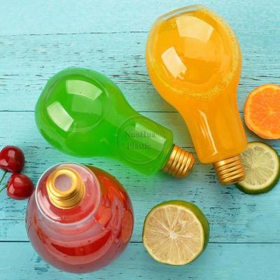 China 500ml Plastic Lamp Bulb Shaped Juice Bottle With Aluminum Cap Lamp Bulb Shape Plastic Beverage Bottle for sale