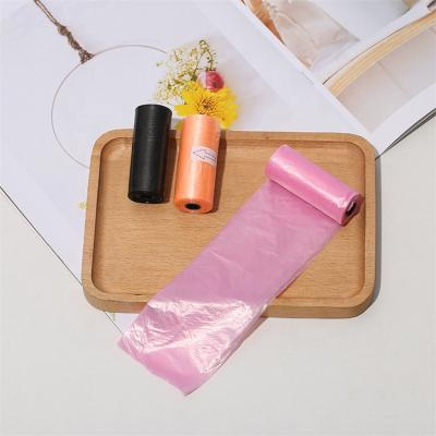 China Sustainable Spot Dog Poop Bag Take Out Continuous Roll Stitch Portable Dog Paw Broken Footprint Multicolor for sale