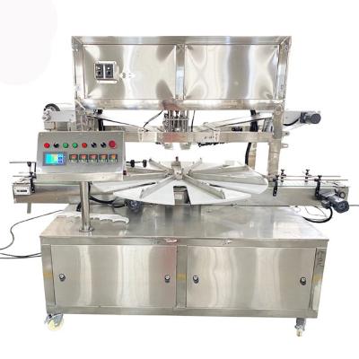 China CH-1800 Automatic Rotary Food Bottles / Cans Filling Sealing Machine for sale