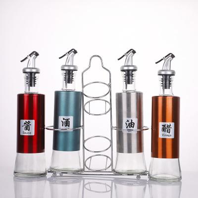 China Freshness Preservation Kitchen Glass Container Sauce Bottle Oil Dispenser Stainless Steel Hot Selling Oil Bottle for sale