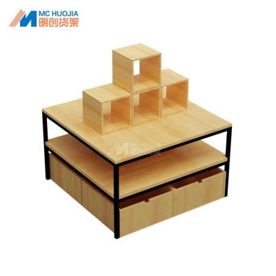 China All Kinds Of Store Miniso Acrylic Corner Shop Display Stand Square Rack for sale