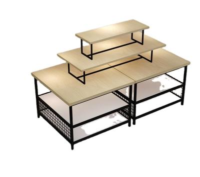 China Wholesale Miniso Style Metal Display Table Shelf Commercial Cosmetic Factory Shop Display Rack for sale