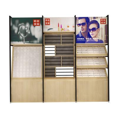 China All kinds of Miniso 2018 store style wooden eyeglass display cabinet, wall mount eyeglass display rack, metal eyeglass display stand for sale