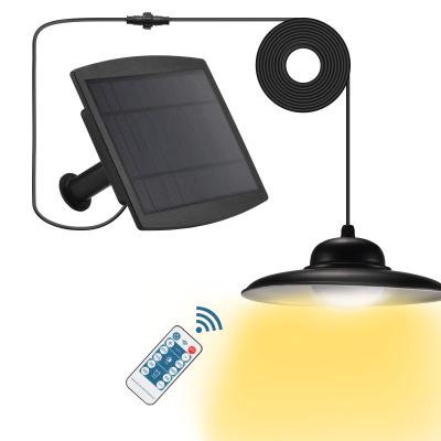 China Pluggable Solar Garden Floor Shed Lights Remote Custom Printed Super Bright Powerful Outdoor Indoor Lamp Outdoor Solar Light Pendant for sale