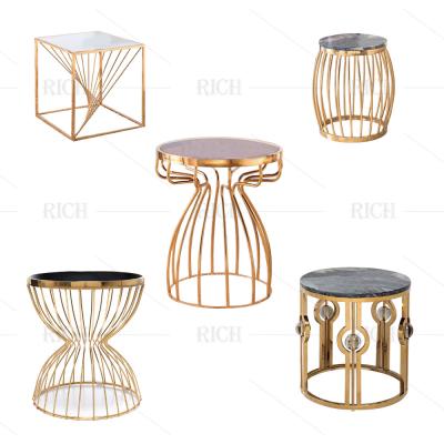 China Modern Cavity Base Stainless Steel Gold Marble Coffee Table Side Table With Titanium Plating for sale