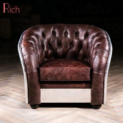 China Vintage Industrial American Tufted Single Button Leather Armchair Deep Tufted Classic Bistro Aluminum Sofa for sale