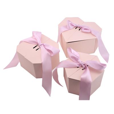 China Recycled Materials Valentine's Day Lipstick Gift Box Rose Birthday Gift Box Luxury Rigid Cardboard Bow Gift Packaging Octagonal Paper Box for sale