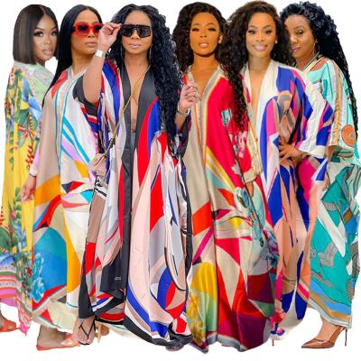 China 2021 New Arrivals Anti-Static Plus Size Dress Women Casual V-Neckline Printing Summer Maxi Dresses Loose Ethnic Clothing for sale