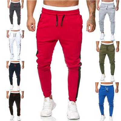 China Newest Fashion Gym Pants QUICK DRY Wholesale Polyester Splice Long Empty Men Stacked Jogging Pants Custom Sport Tracksuit for sale