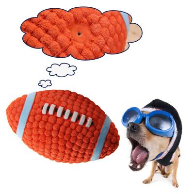 China Viable Factory Direct Pet Toy Interactive Latex Rugby Sound Ball Teeth Dog Toy for sale