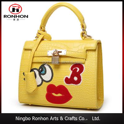 China 2017 Innovative new TOGGLE BAG products lady embroidery handbag PU leather bag buy directly from china factory for sale