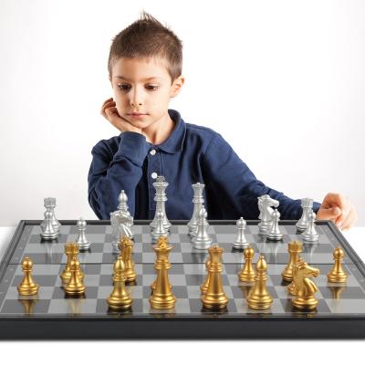 China Eco-Friendly Custom Set Directly Manufactures International Chess Board Game Magnetic Plastic Gold And Silver Chess Pieces for sale