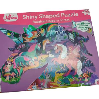 China Cartoon Toy 100 Pieces Of Unicorn Forest Shiny Shaped Puzzle With Magical 15 Shaped Pieces Hidden Enchanting To Find for sale